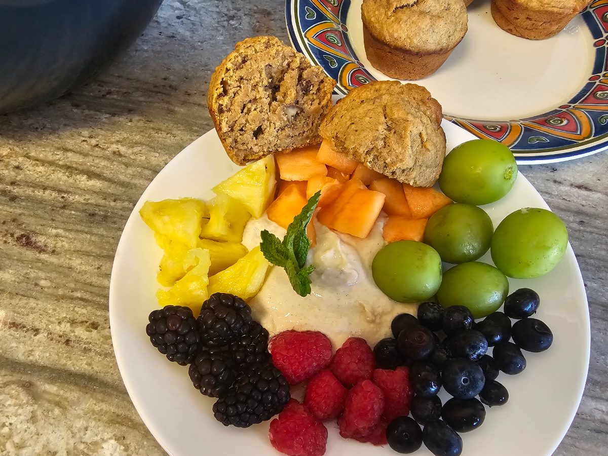 Close-up of Sweet Potato Banana Muffins with Yogurt Dip and Fresh Fruit